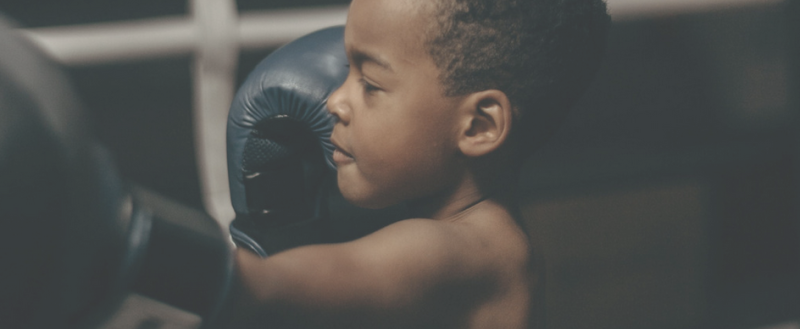 Child boxing for positive sensory input