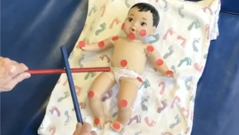 Using Rhythm Sticks to promote neuro-development in infants